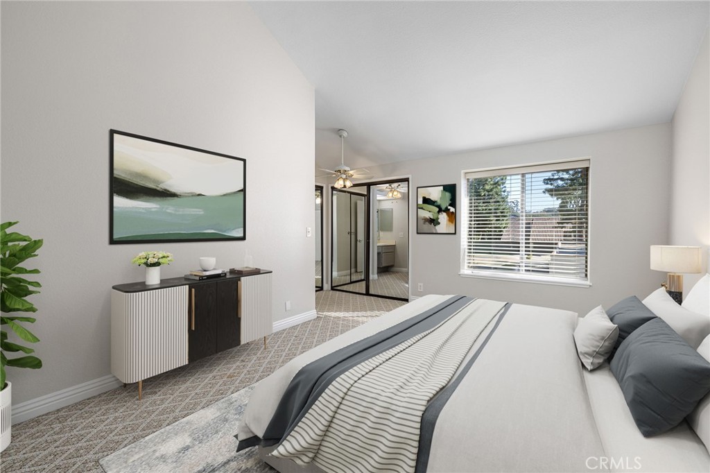 711 Santa Rosa San Dimas, CA 91773 - Photo 18 of 32 a bedroom with a bed and a flat screen tv