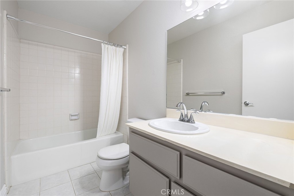 711 Santa Rosa San Dimas, CA 91773 - Photo 23 of 32 a bathroom with a sink a toilet and shower
