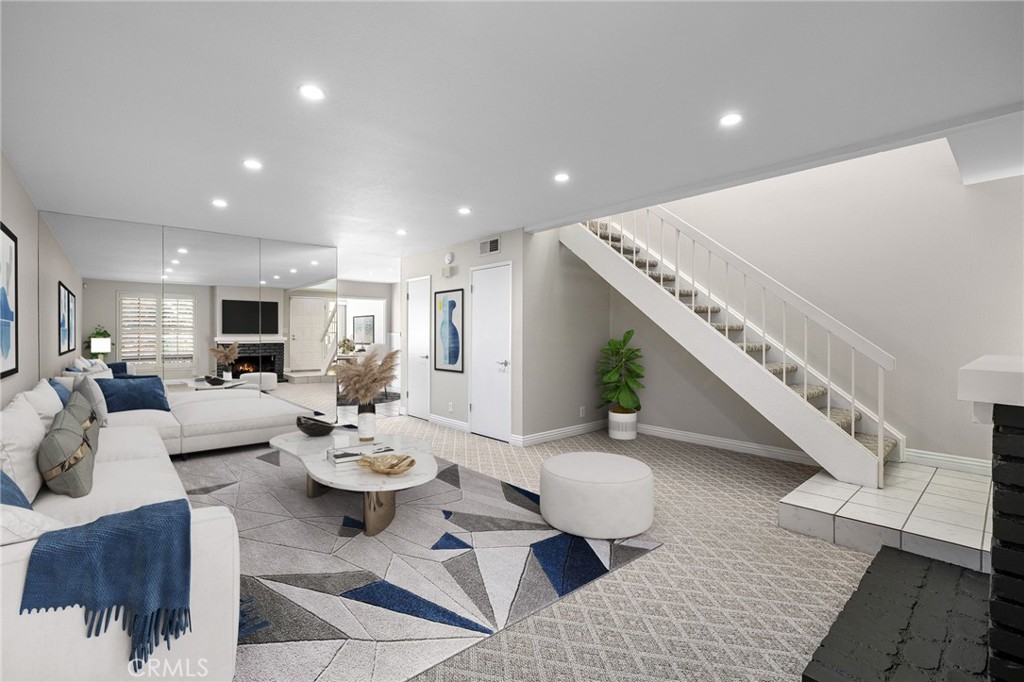 711 Santa Rosa San Dimas, CA 91773 - Photo 6 of 32 a living room with furniture kitchen view and a chandelier