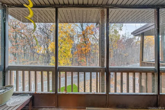 a view of a small yard from a balcony