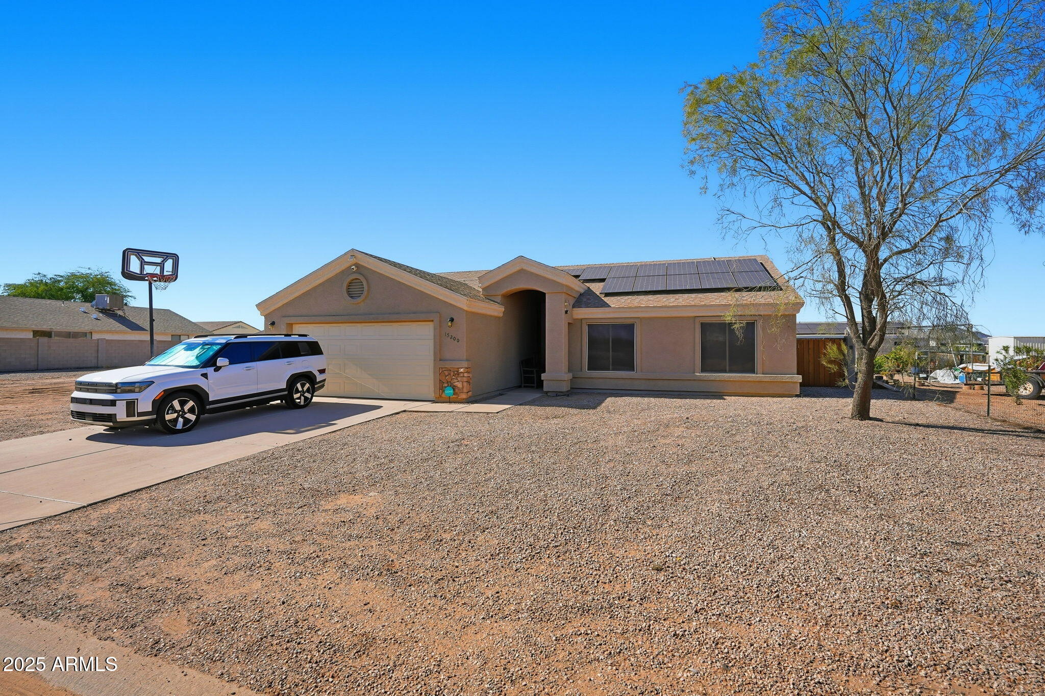 15200 South Redondo Road Arizona City, AZ 85123 - Photo 2 of 36 a car parked in front of house with a car parked