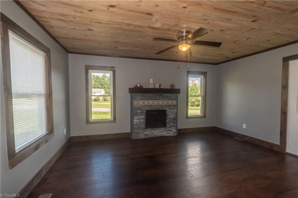 5156 Westfield Road Mount Airy, NC 27030 - Photo 3 of 21 Large living Room with Fireplace, custom mantle, outlets over the mantle ready for TV!
