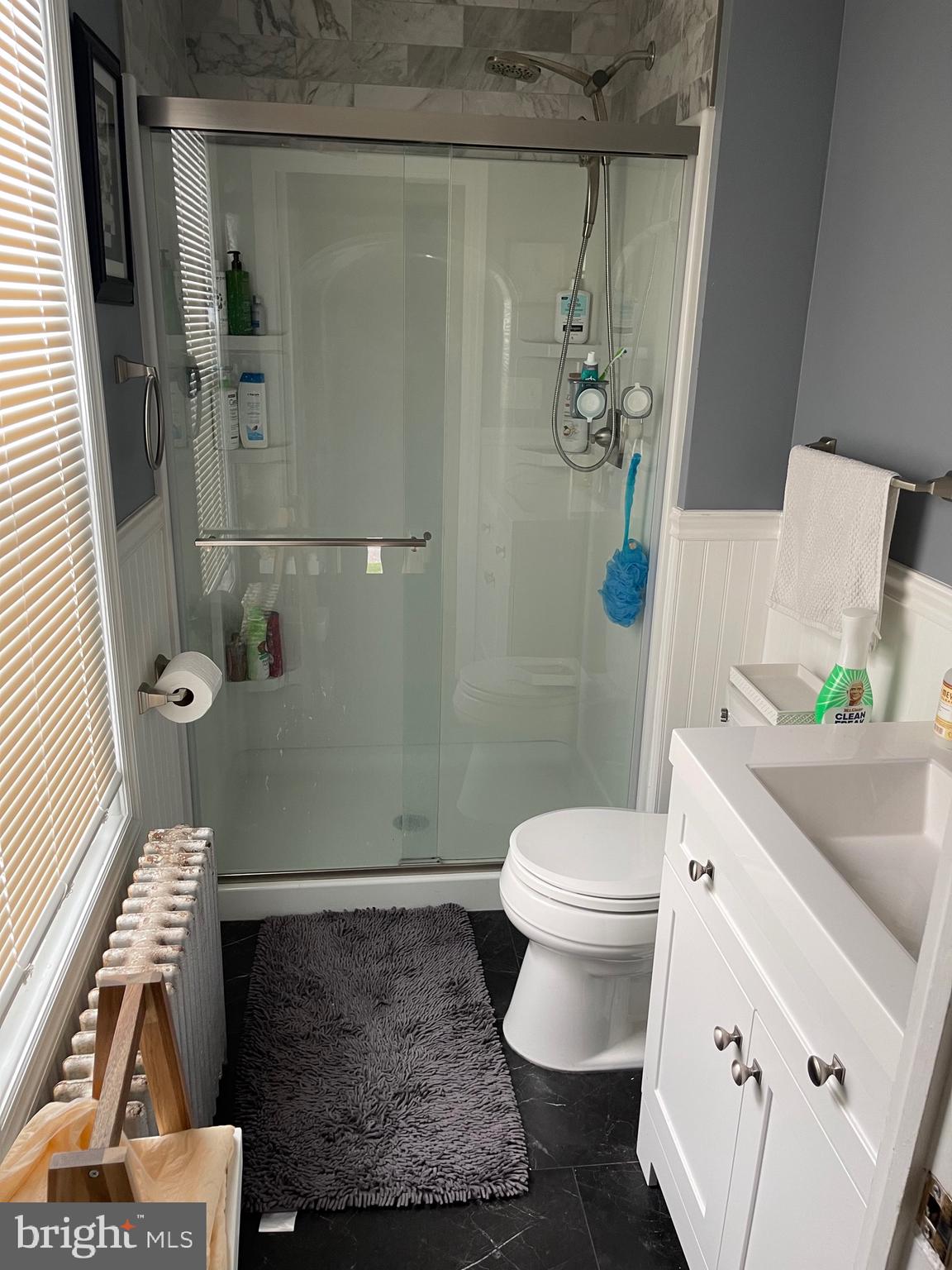 121 Spring Garden Street Riverside, NJ 08075 - Photo 16 of 26 a bathroom with a sink and toilet