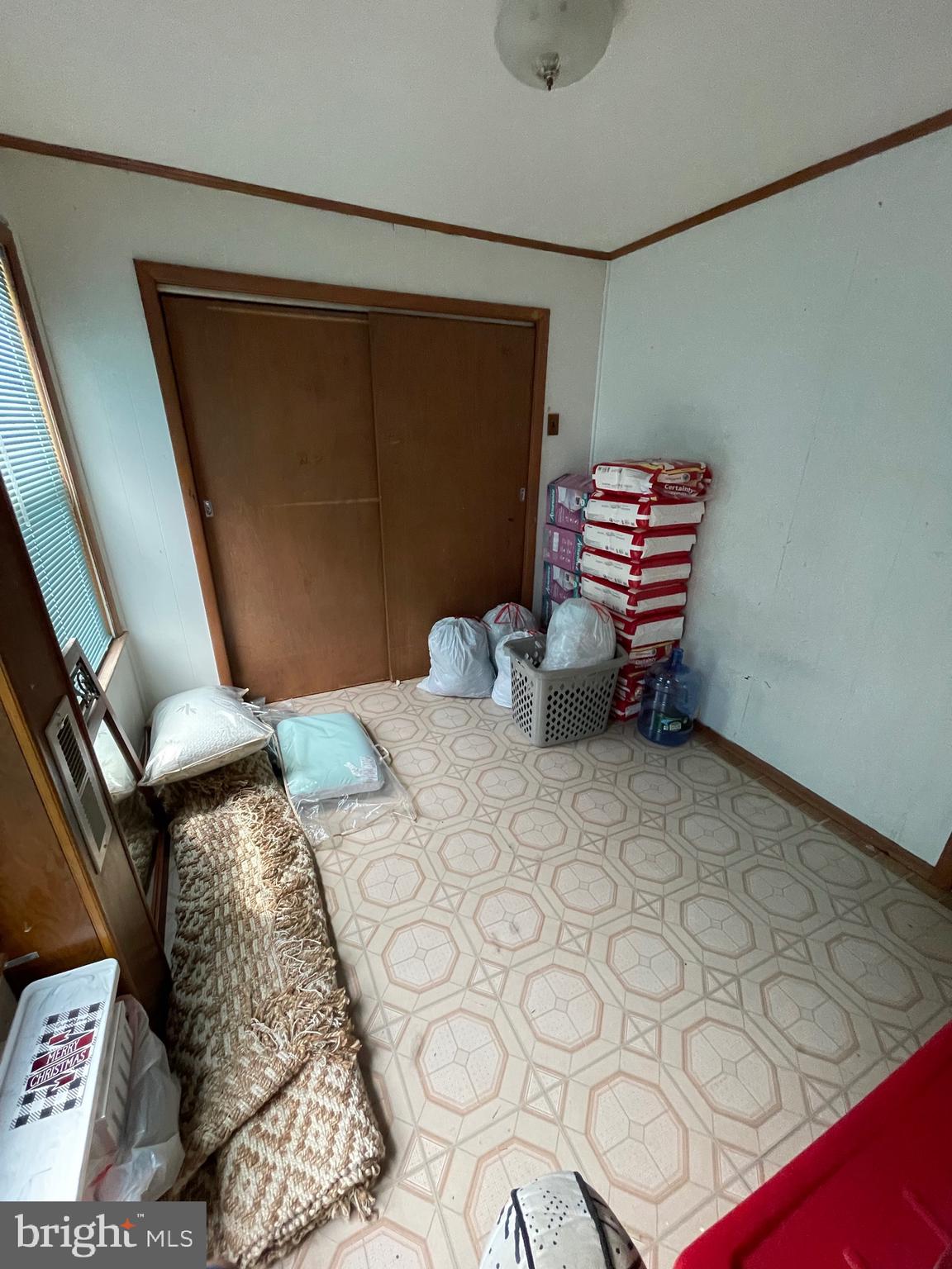 121 Spring Garden Street Riverside, NJ 08075 - Photo 18 of 26 a bedroom with a bed and a cabinets