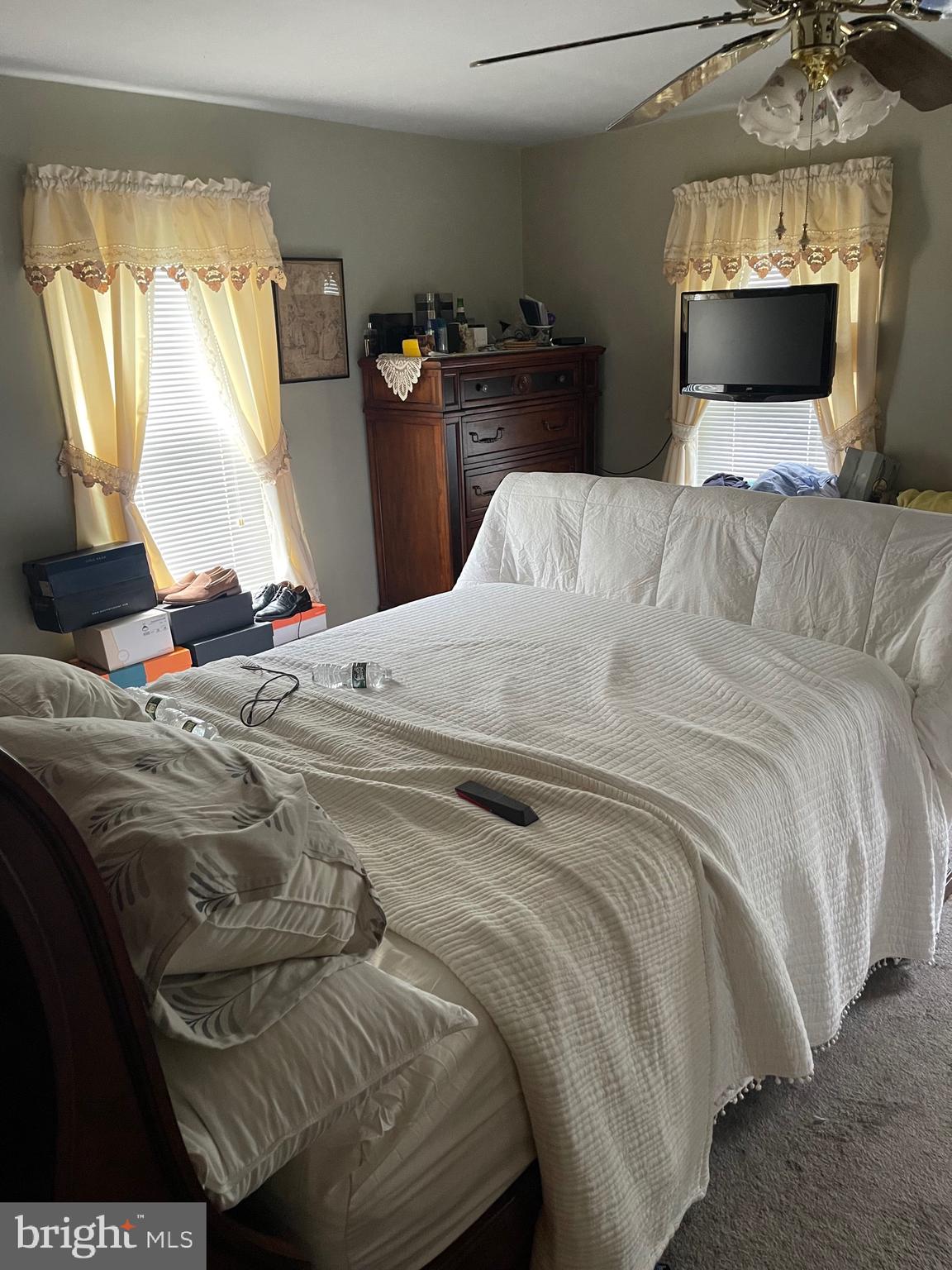 121 Spring Garden Street Riverside, NJ 08075 - Photo 19 of 26 a bed sitting in a bedroom next to a window