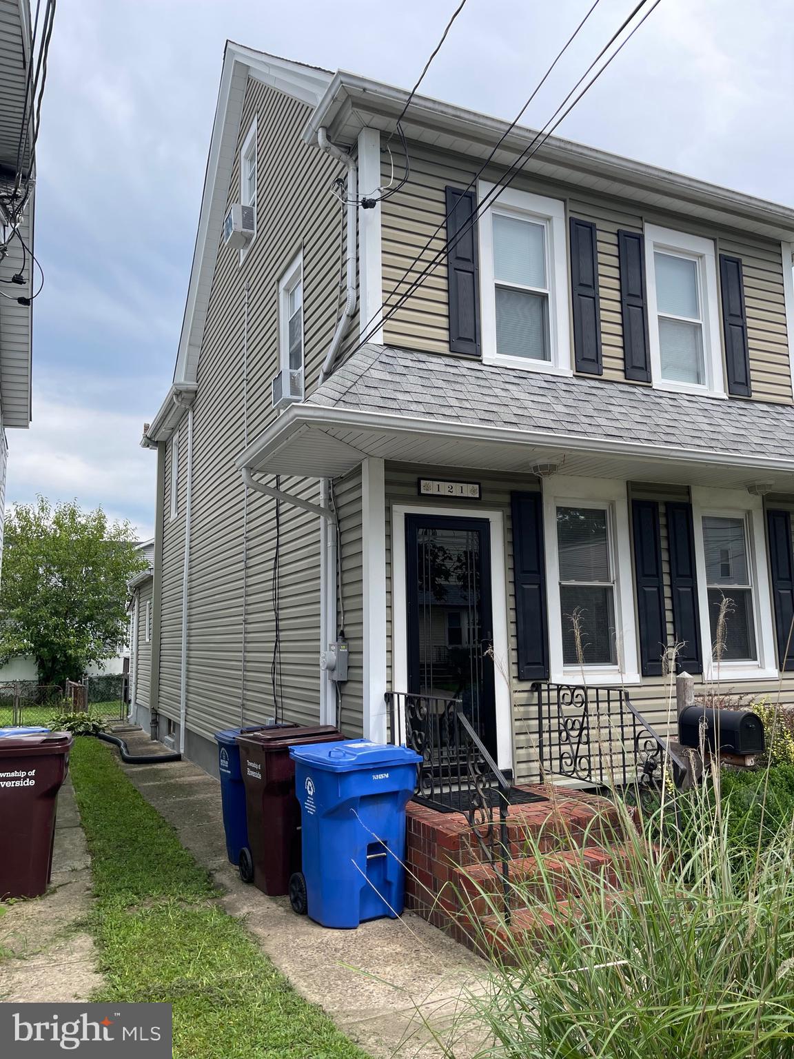 121 Spring Garden Street Riverside, NJ 08075 - Photo 3 of 26 front view of a house with a yard