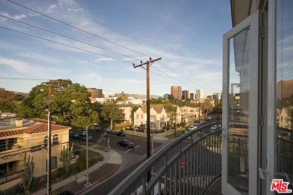 a view of a balcony with an ocean view