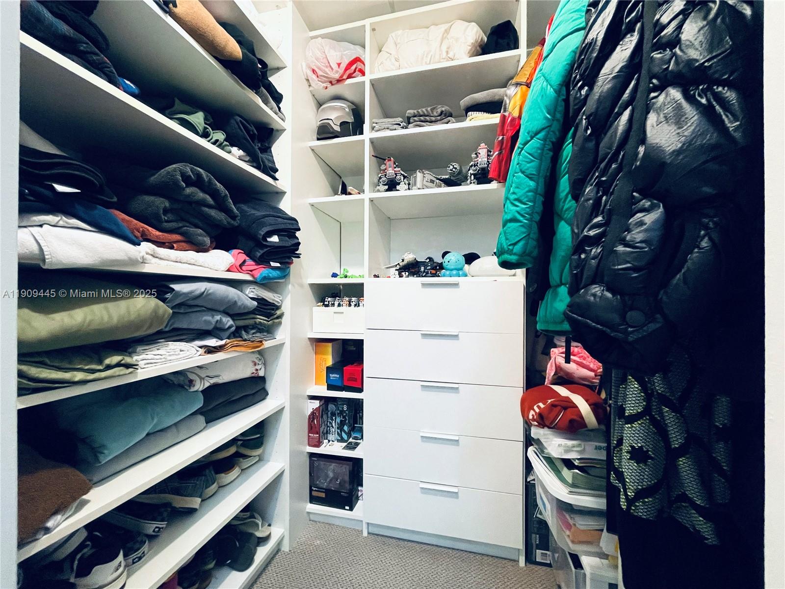 888 Douglas Road, Unit 119 Coral Gables, FL 33134 - Photo 24 of 36 a utility room with dryer and washer
