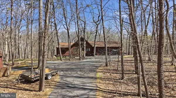 a view of a backyard of the house