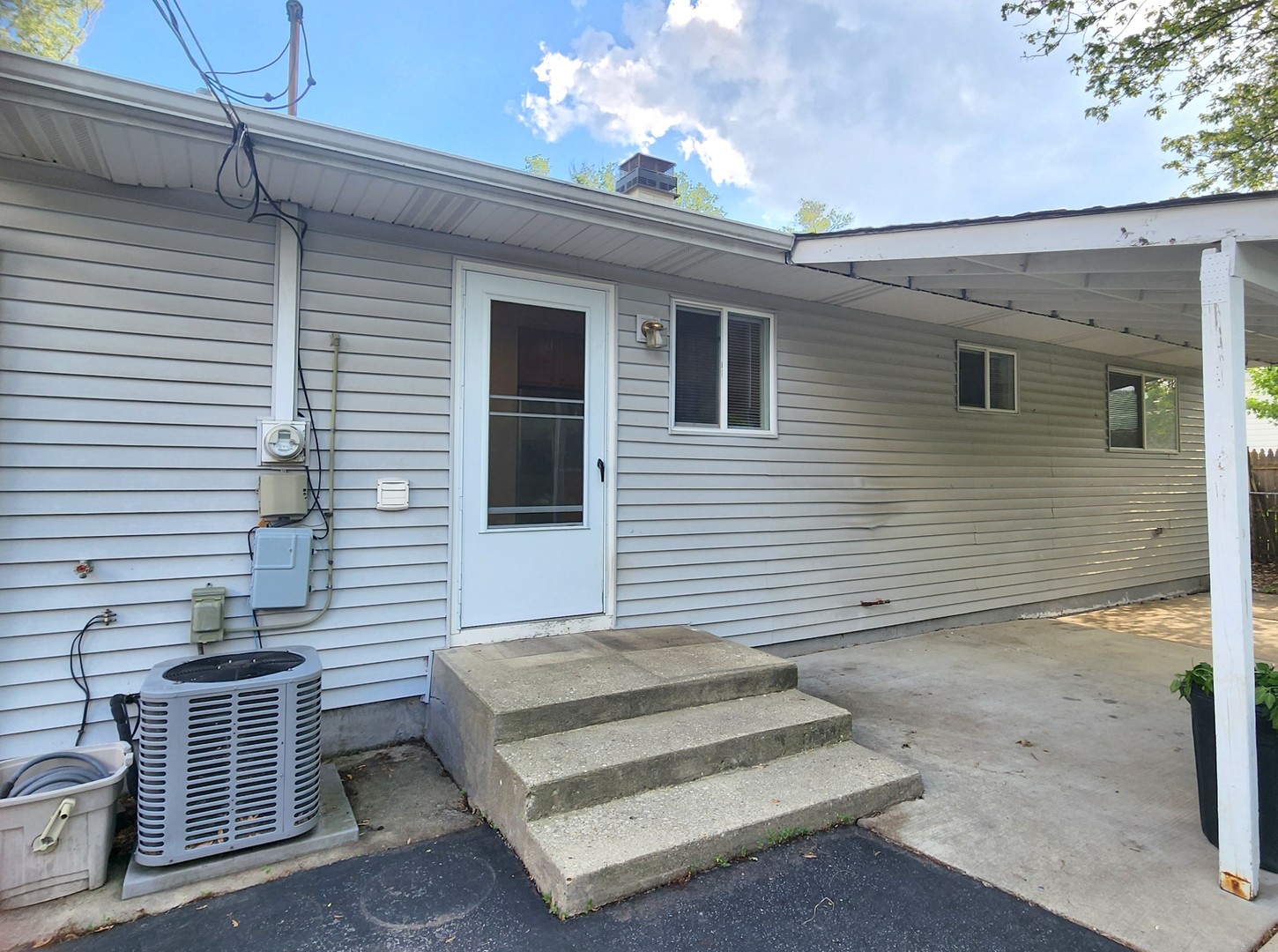 208 Albert Terrace Wheeling, IL 60090 - Photo 14 of 15 a view of a house with a balcony and wooden floor