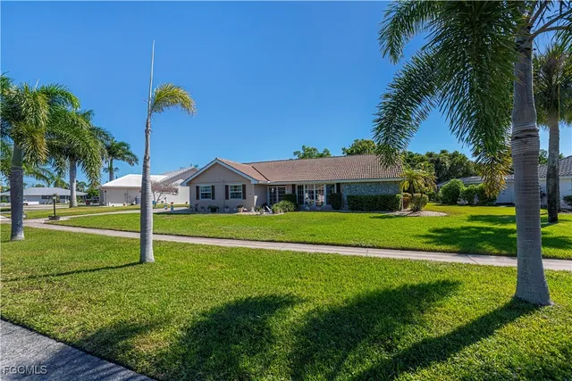 a view of a house with a big yard