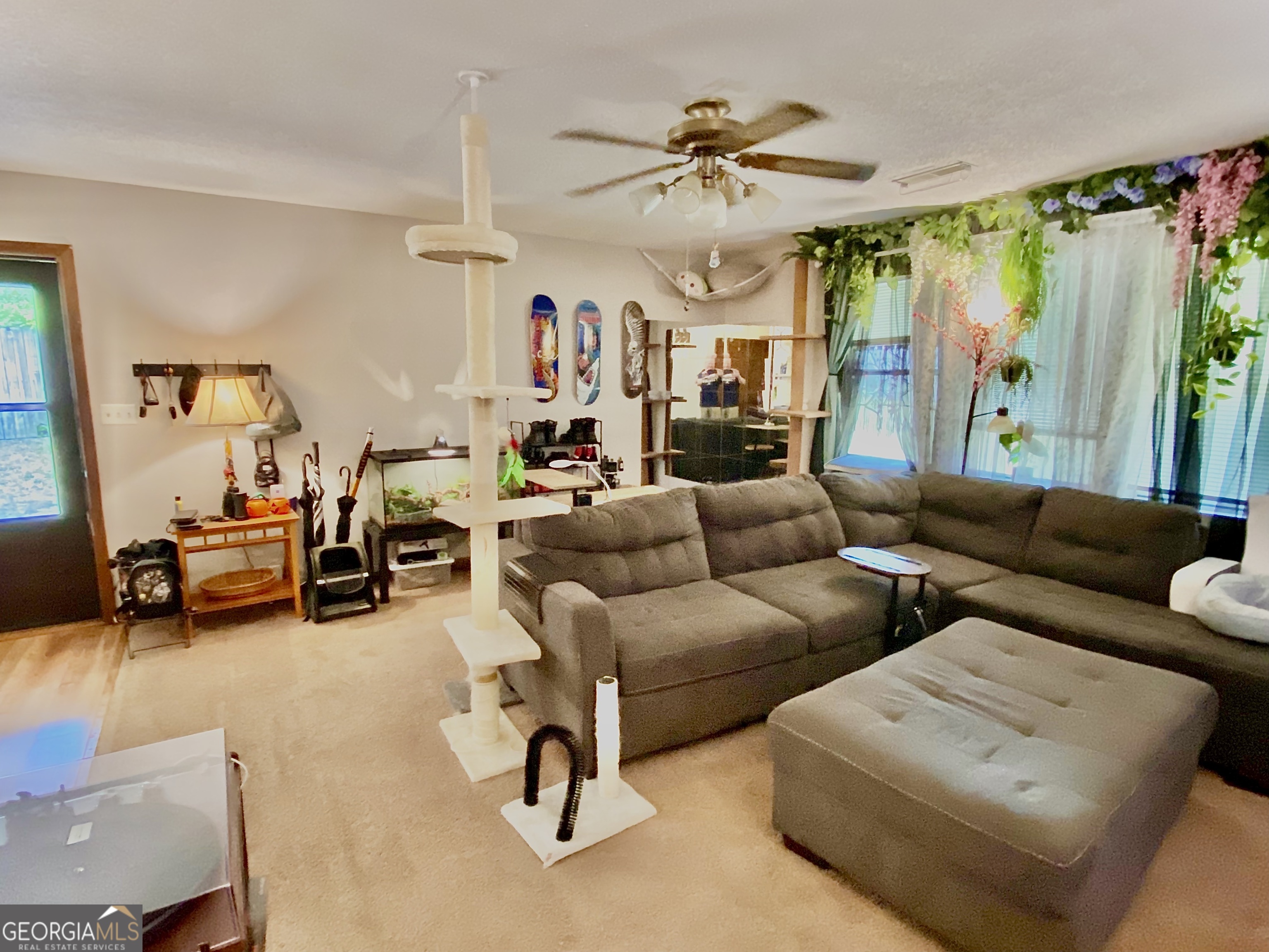 253 Stancil Drive Toccoa, GA 30577 - Photo 12 of 26 a living room with furniture and a chandelier