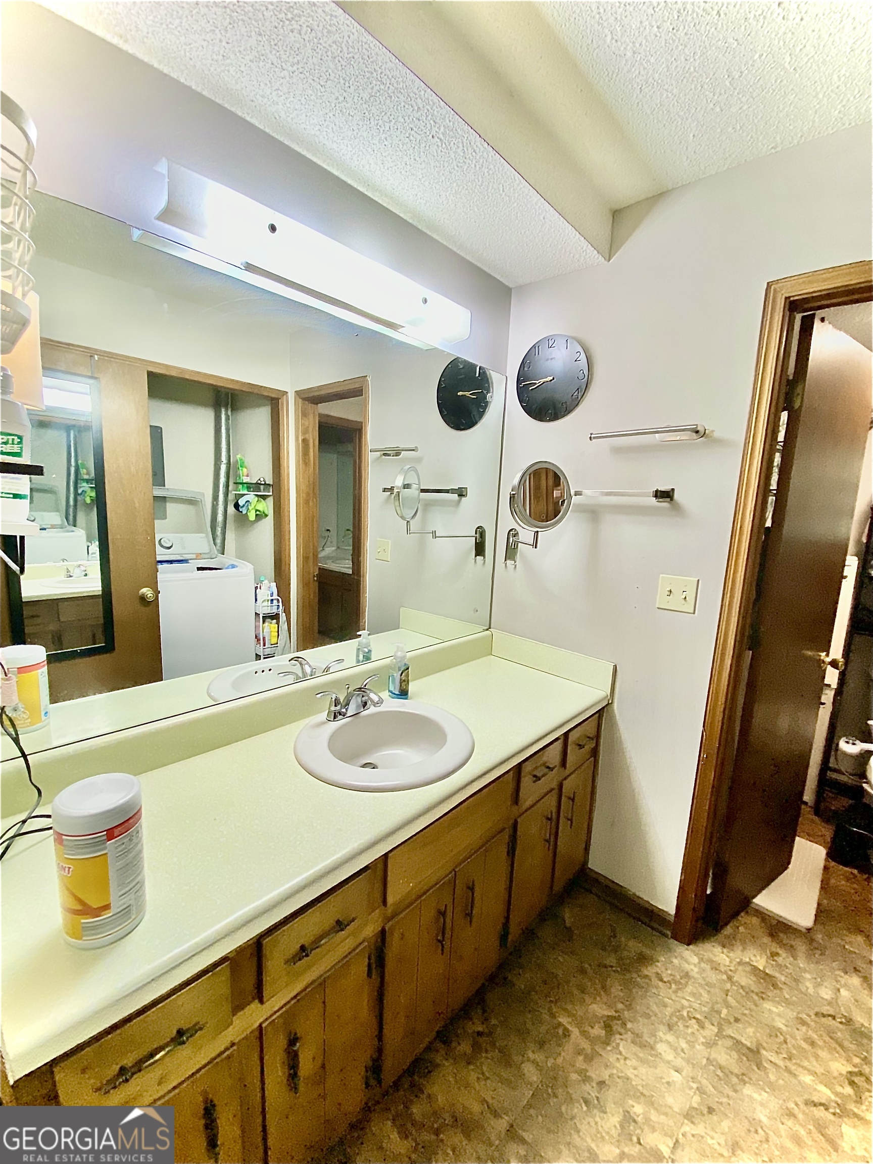 253 Stancil Drive Toccoa, GA 30577 - Photo 17 of 26 a spacious bathroom with a sink and a mirror
