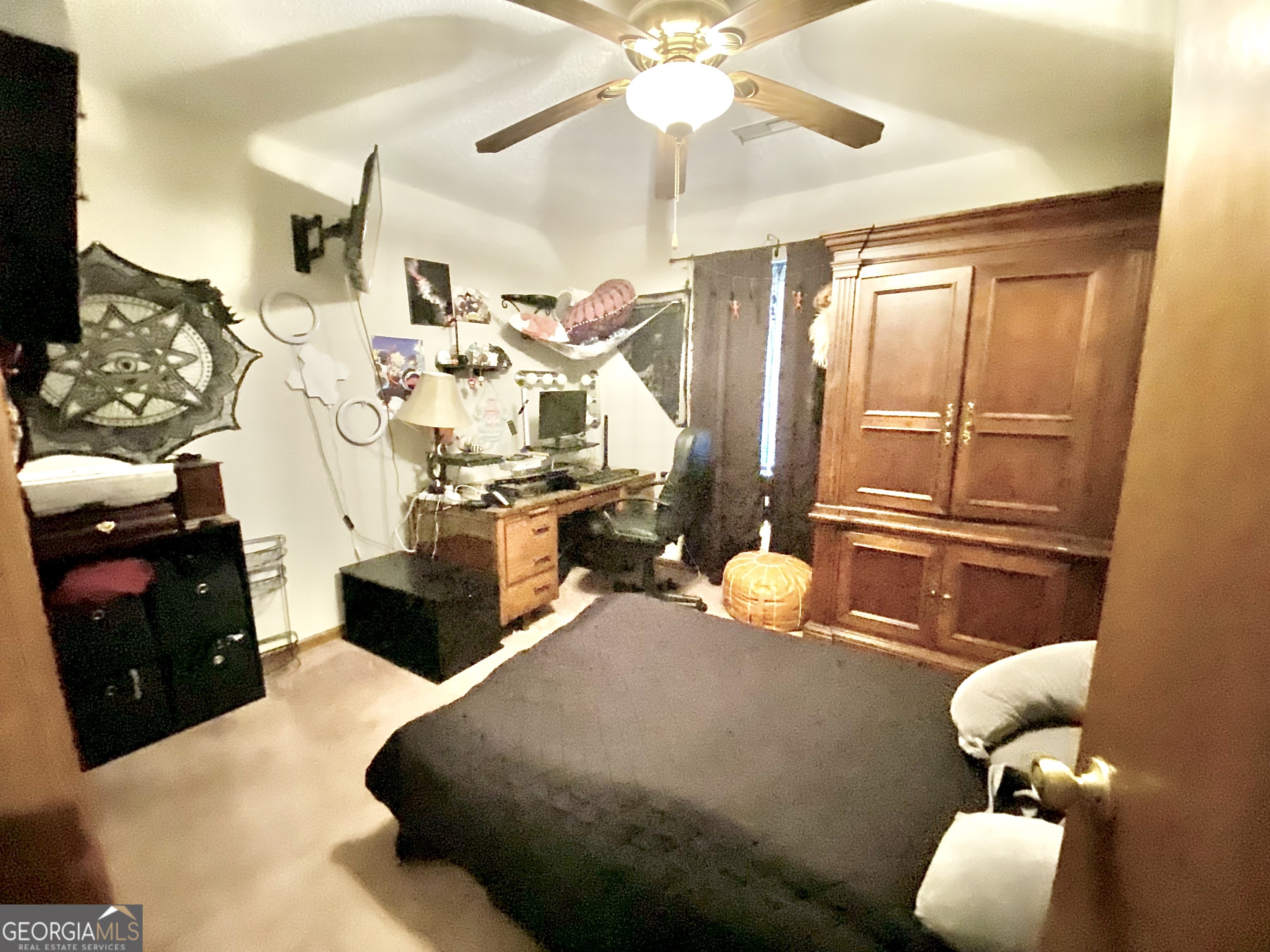 253 Stancil Drive Toccoa, GA 30577 - Photo 24 of 26 a bedroom with furniture and a flat screen tv