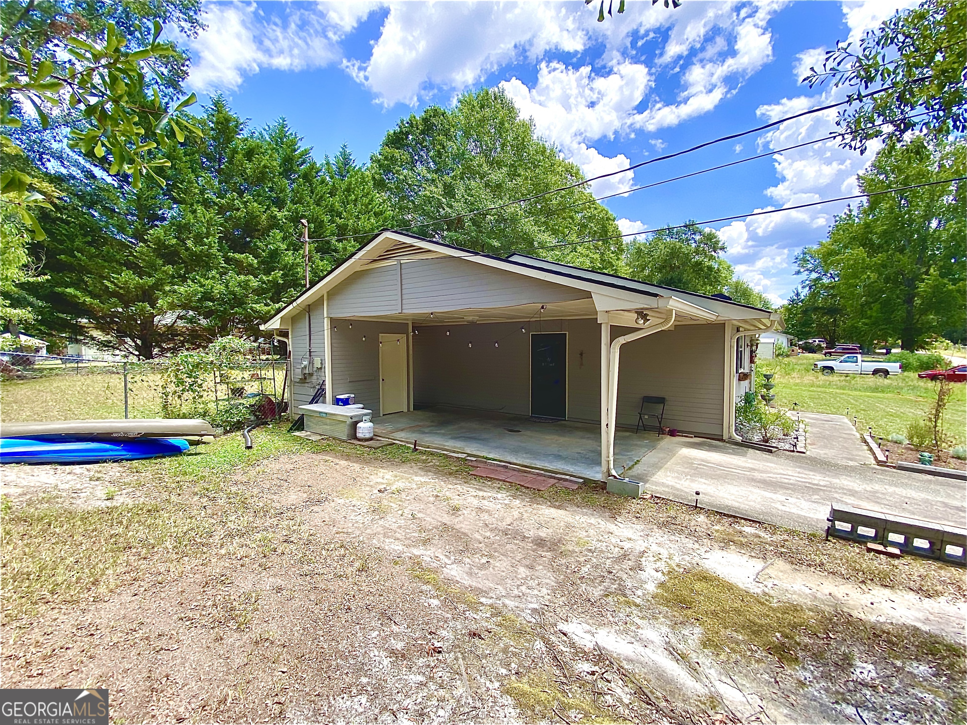 253 Stancil Drive Toccoa, GA 30577 - Photo 10 of 26 a view of a house with backyard and sitting area