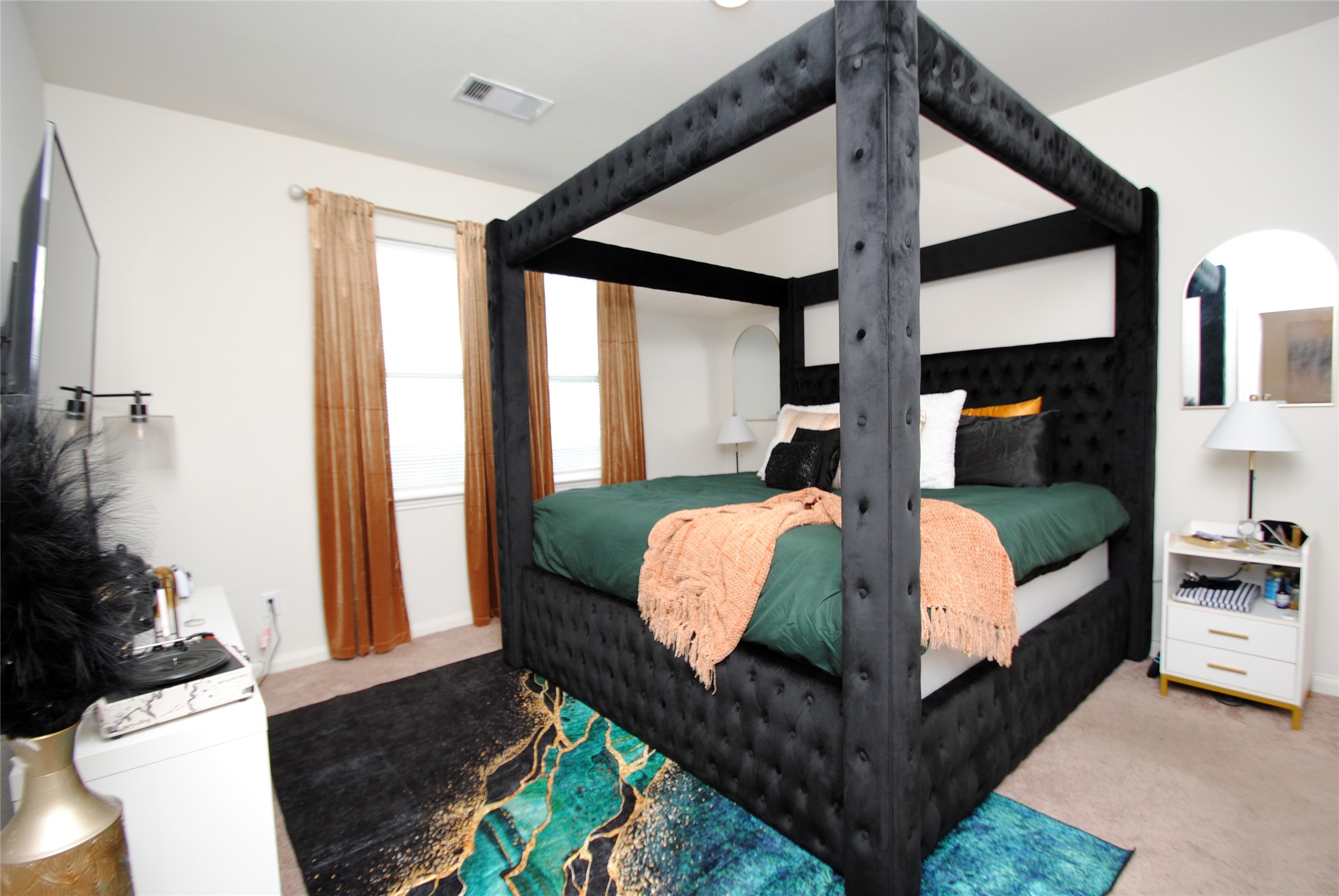 2133 Mule Ridge Drive Katy, TX 77493 - Photo 14 of 25 a bedroom with a large bed and a large window