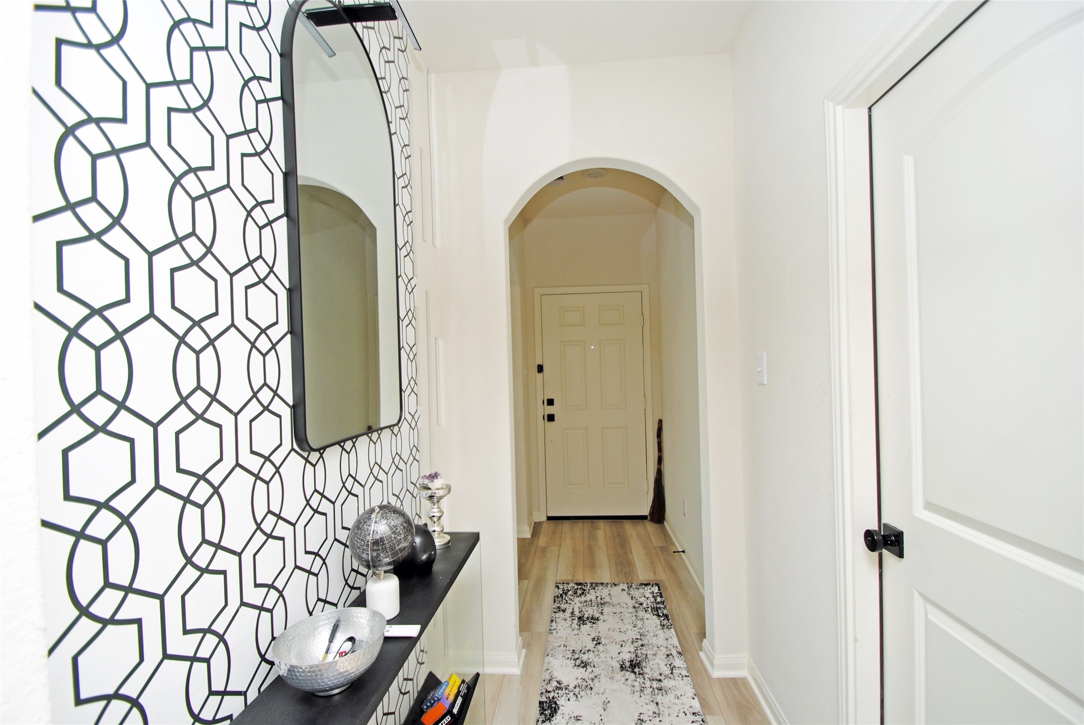 2133 Mule Ridge Drive Katy, TX 77493 - Photo 3 of 25 a view of an entryway with wooden floor