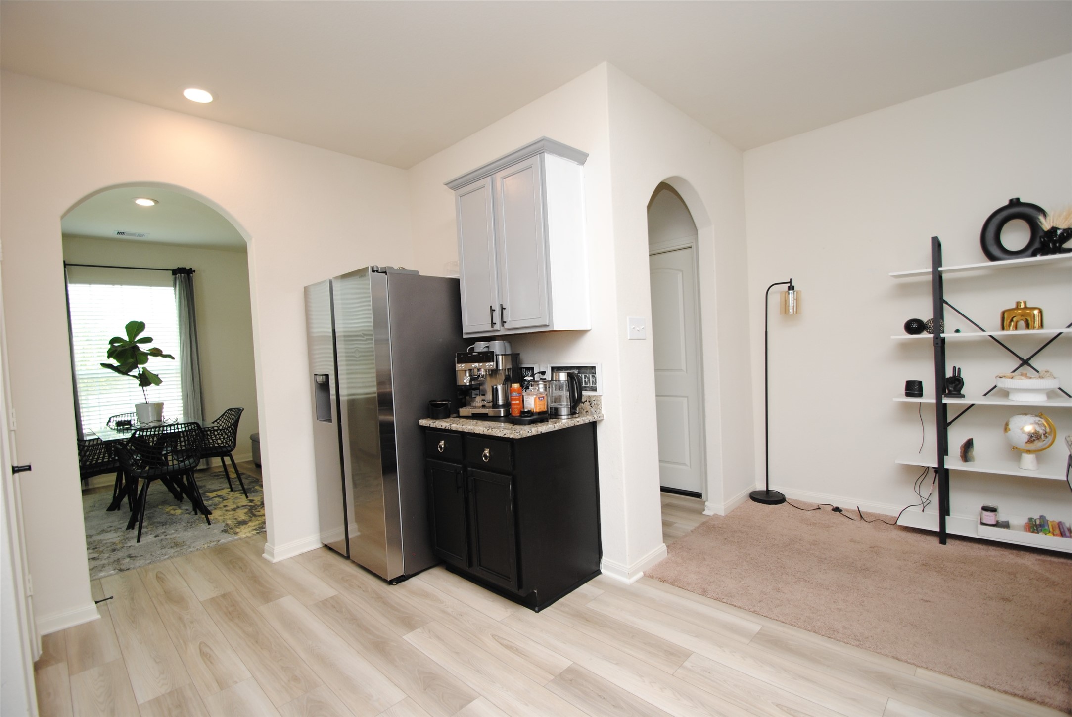 2133 Mule Ridge Drive Katy, TX 77493 - Photo 4 of 25 a kitchen with stainless steel appliances granite countertop a refrigerator and a sink