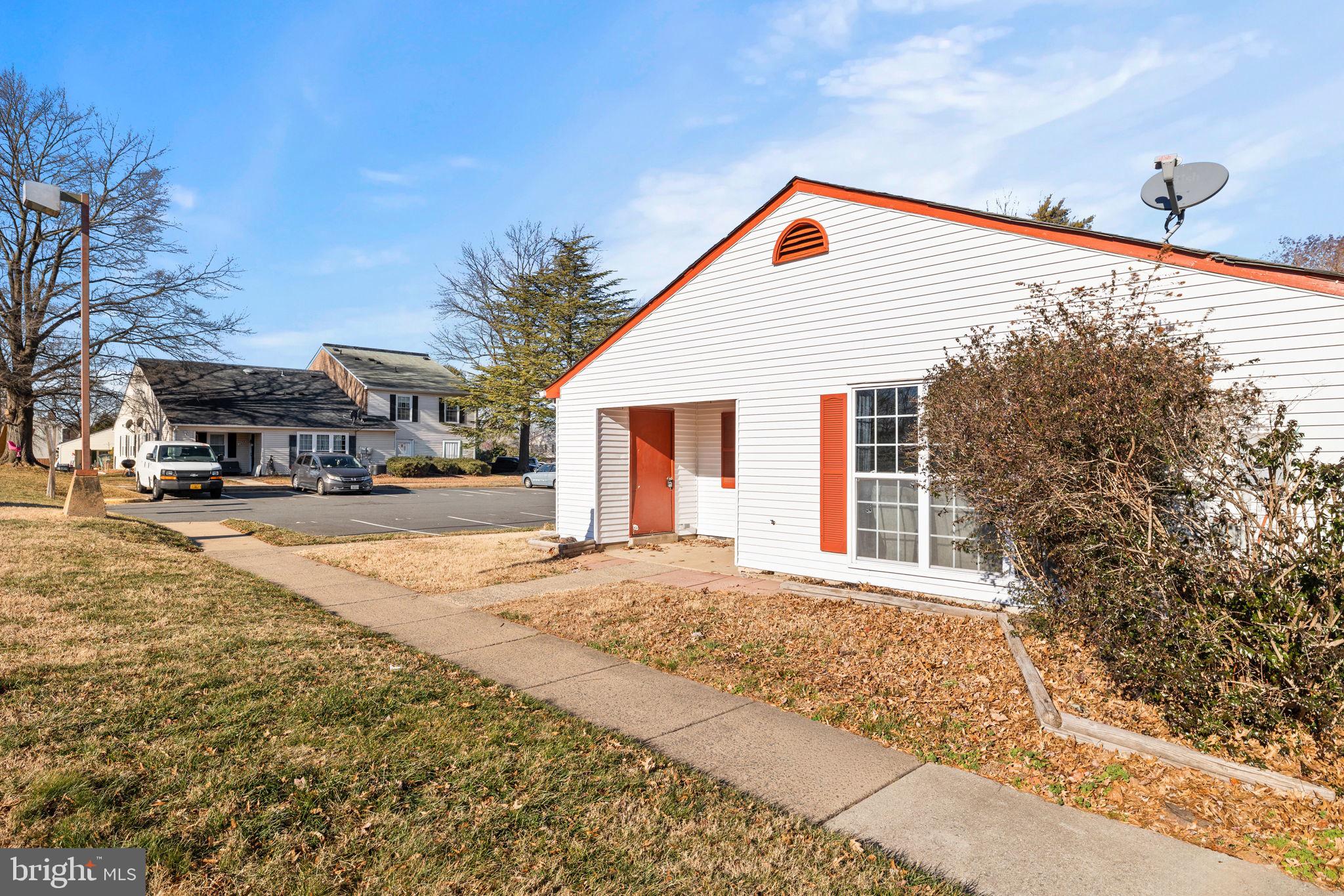 7699 Callan Drive Manassas, VA 20109 - Photo 2 of 11 a view of a house with snow on the road