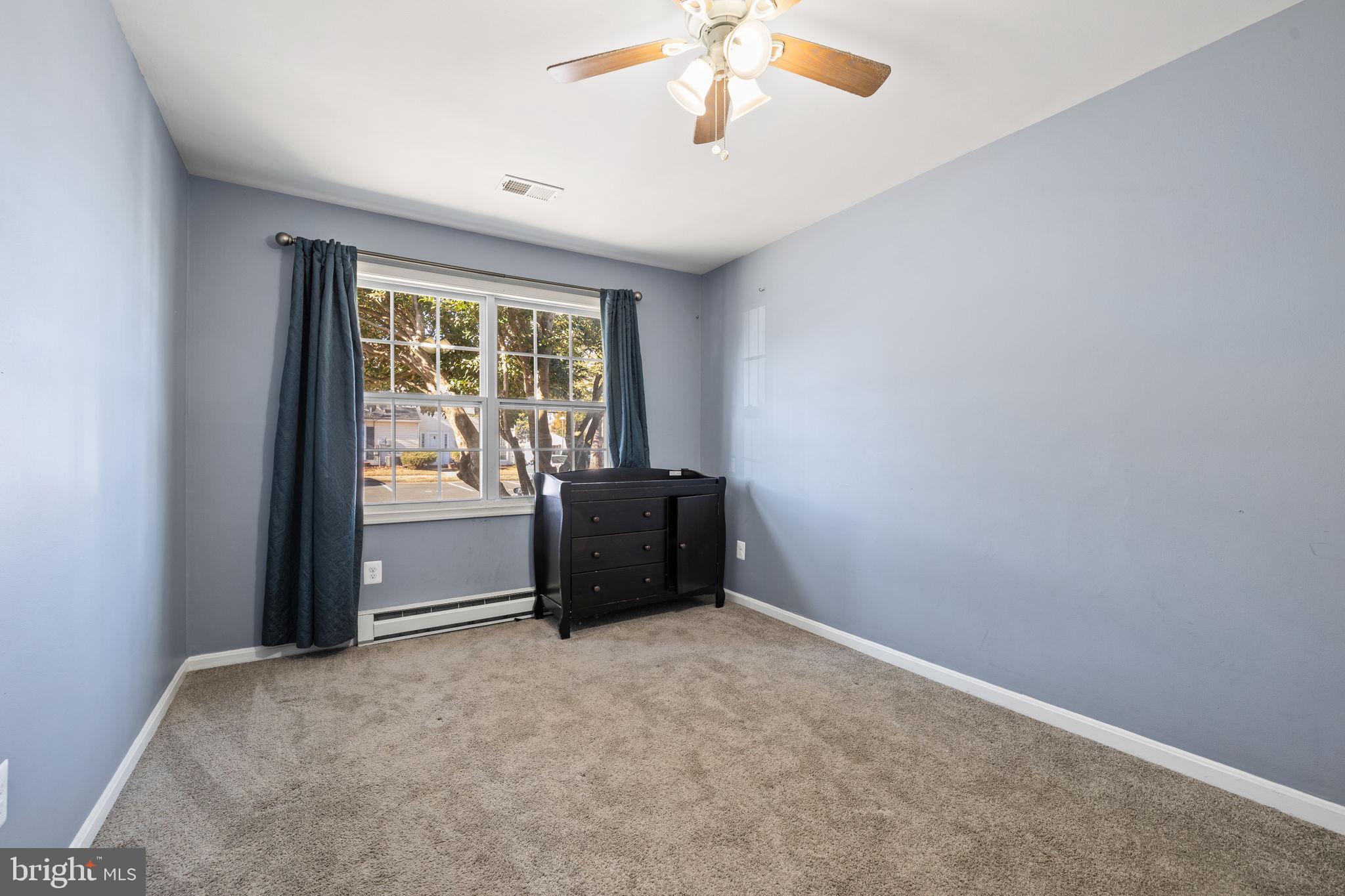 7699 Callan Drive Manassas, VA 20109 - Photo 9 of 11 an empty room with a window