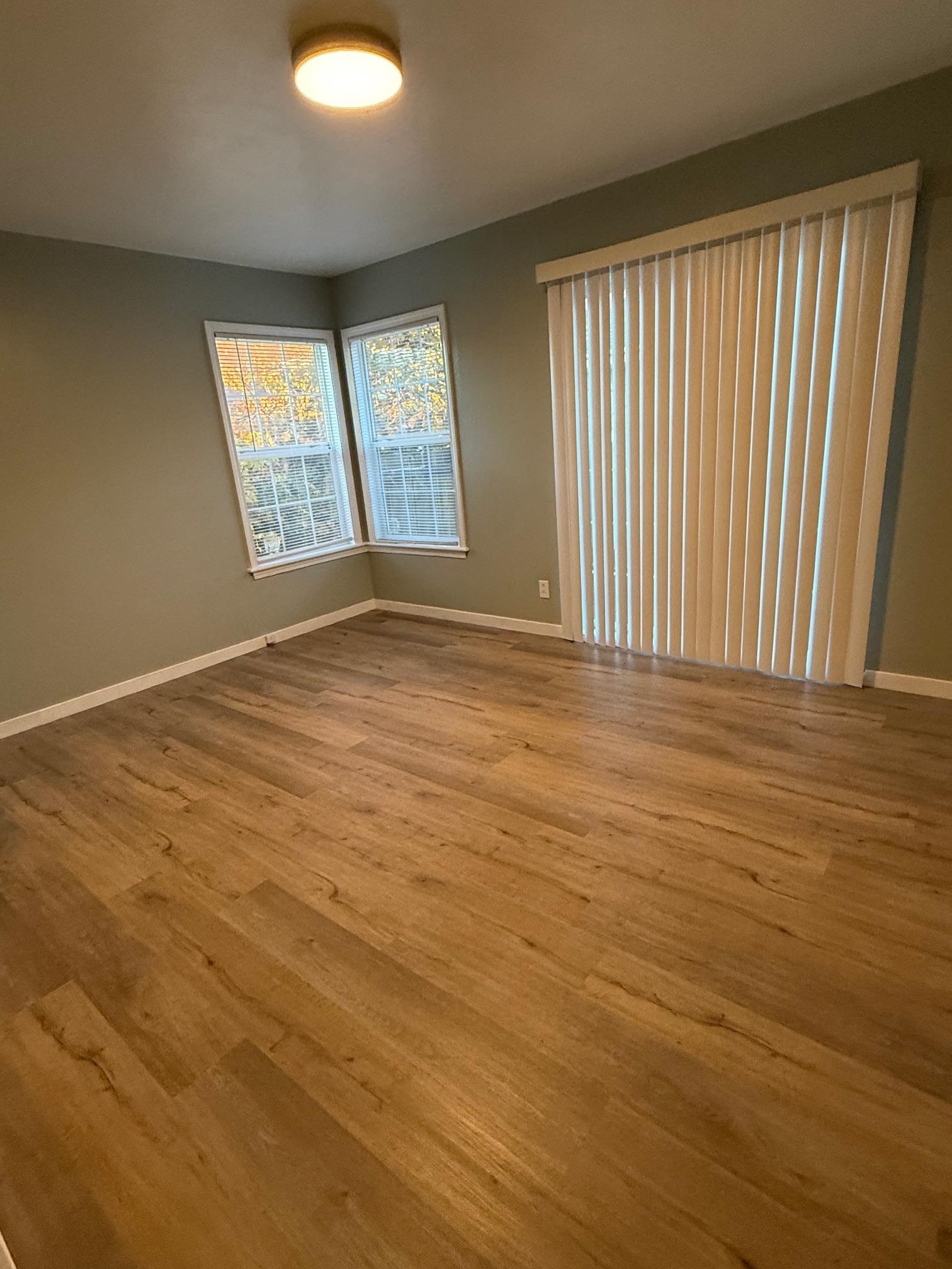 17028 Santa Fe Street Hayward, CA 94541 - Photo 2 of 54 an empty room with windows and closet