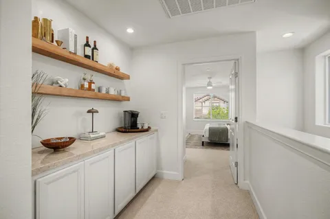 a kitchen with a sink and a refrigerator