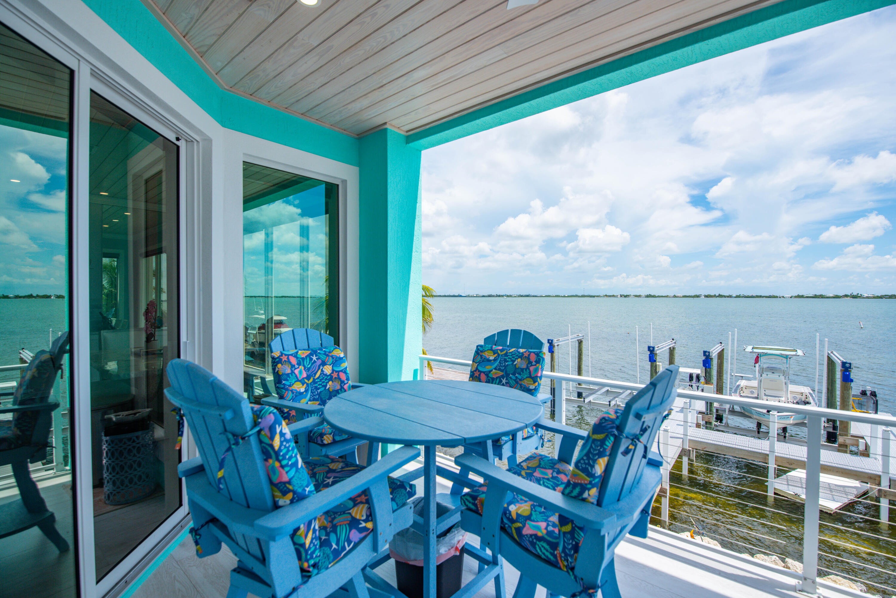 747 La Fitte Road Summerland Key, FL 33042 - Photo 34 of 103 a outdoor dining space with furniture and outdoor view