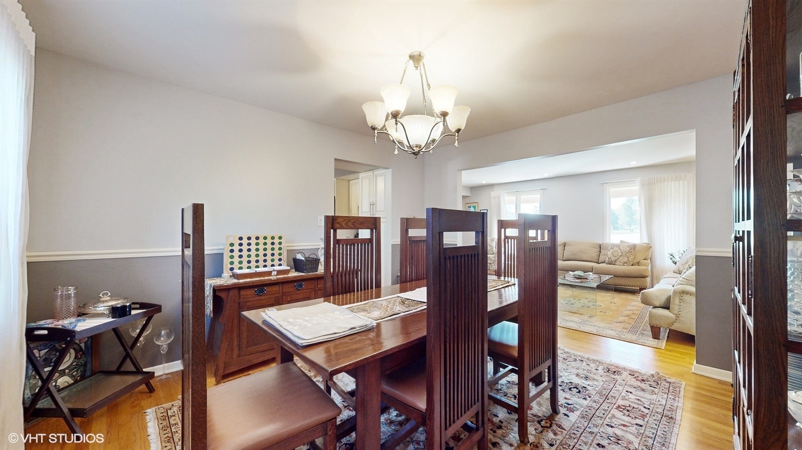 14467 Creekview Drive Orland Park, IL 60467 - Photo 11 of 51 a view of a dining room with furniture and chandelier