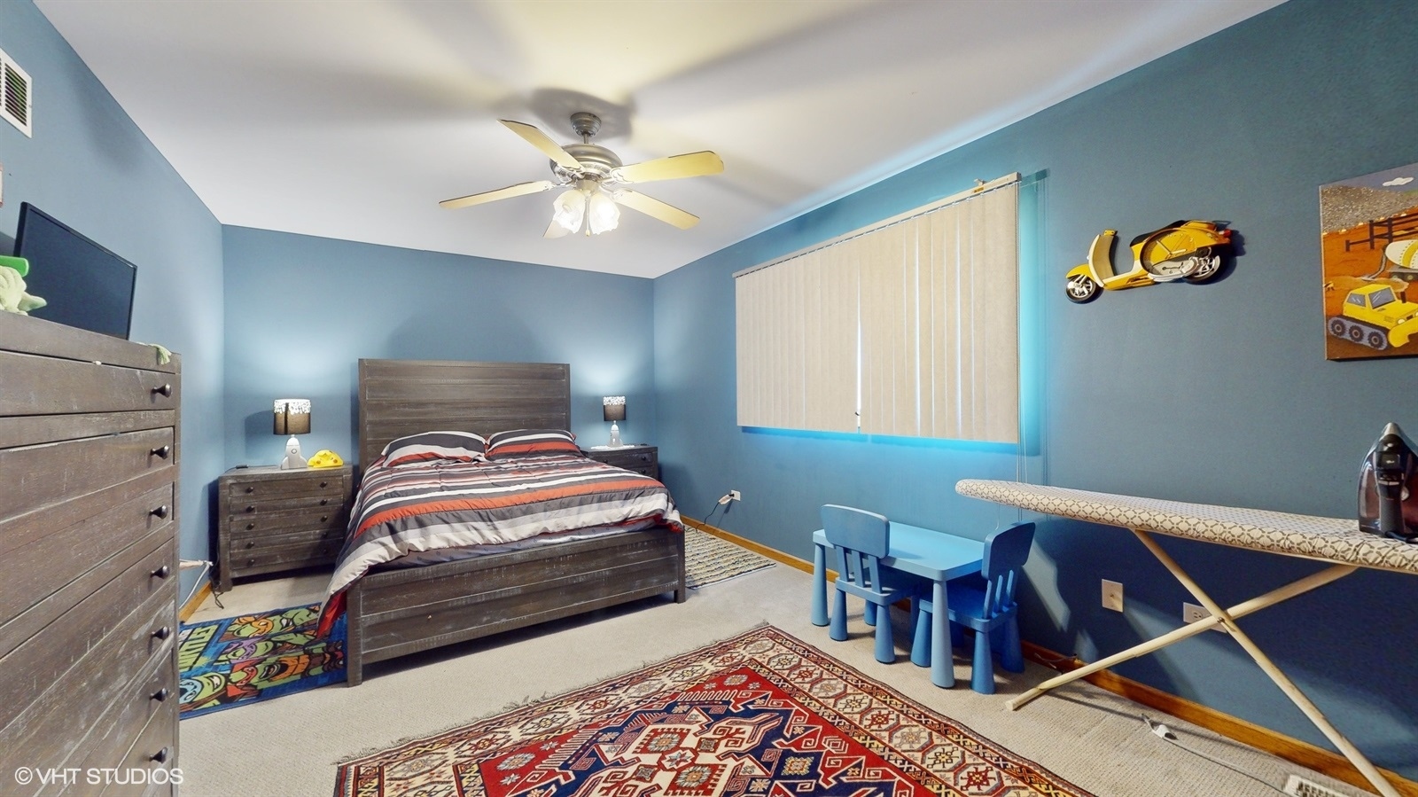 14467 Creekview Drive Orland Park, IL 60467 - Photo 26 of 51 a bedroom with a bed and a chandelier