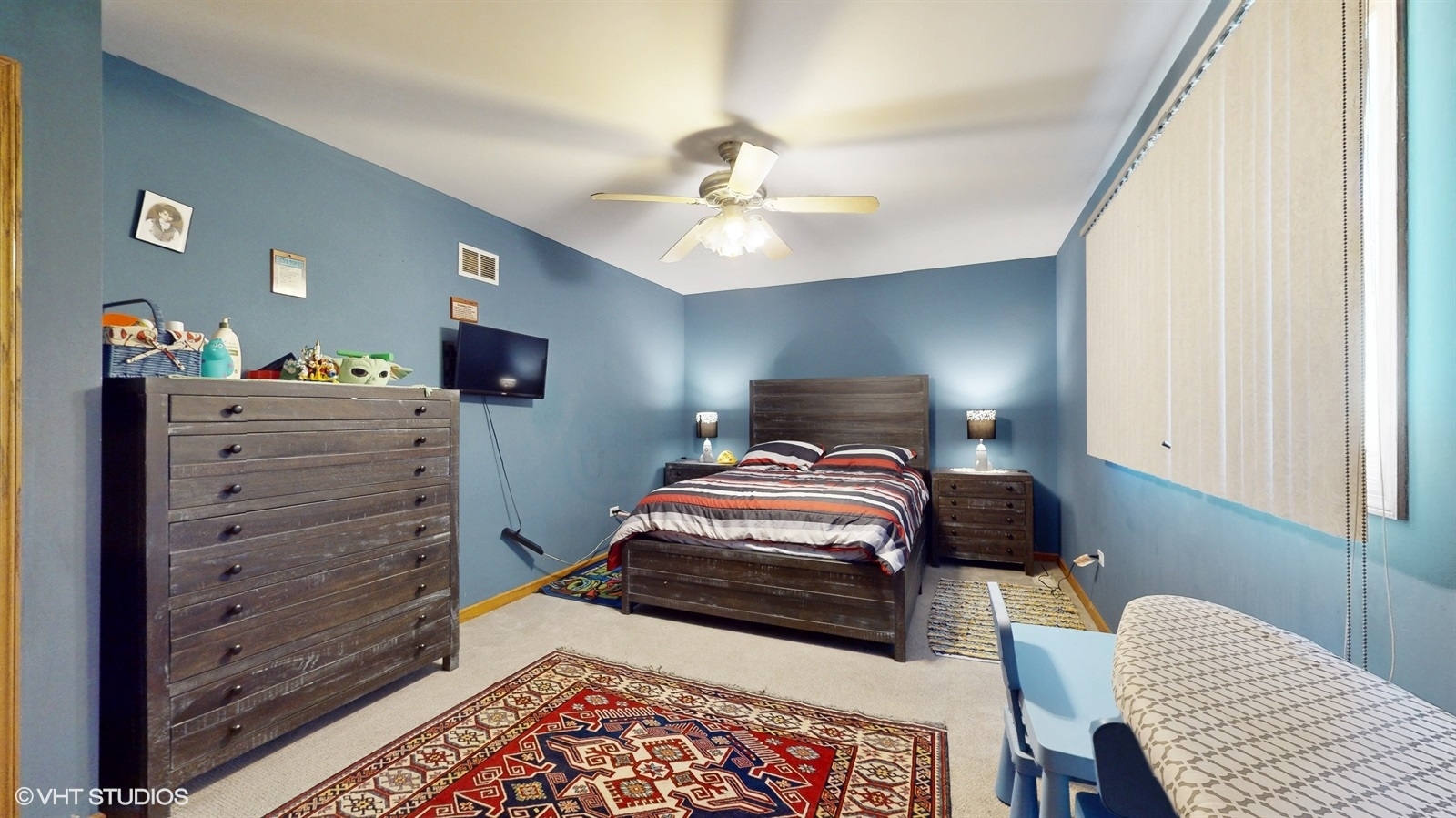 14467 Creekview Drive Orland Park, IL 60467 - Photo 28 of 51 a bedroom with a bed and a chandelier