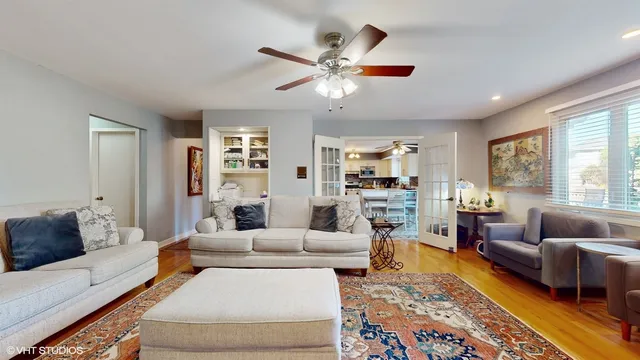 a living room with furniture and a rug