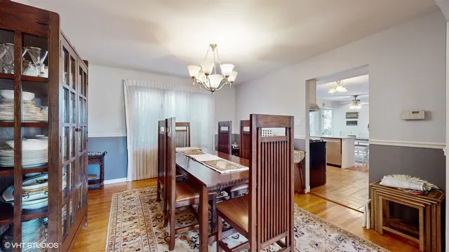 a view of a livingroom with furniture and a kitchen