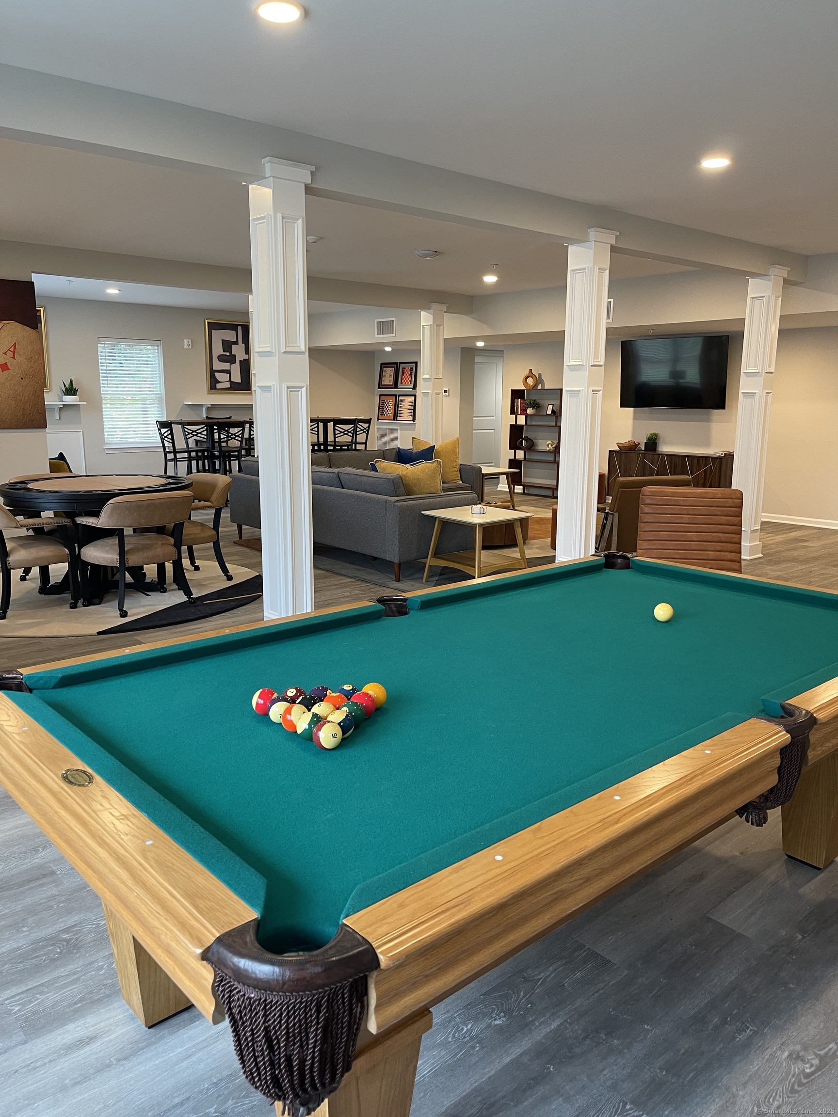 64 East Mitchell Avenue, Unit 27 Cheshire, CT 06410 - Photo 14 of 17 a room with games and windows