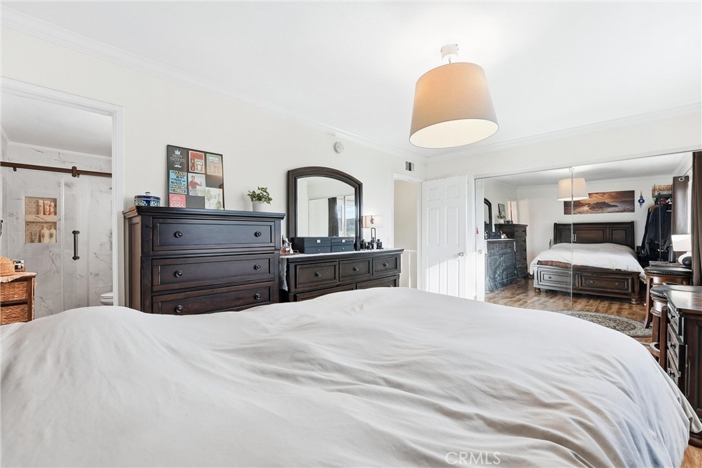 11908 Fallingleaf Circle Garden Grove, CA 92840 - Photo 13 of 30 a bedroom with a bed and dresser