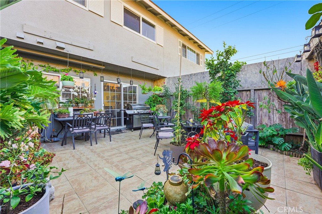 11908 Fallingleaf Circle Garden Grove, CA 92840 - Photo 22 of 30 a group of people sitting in front of a building