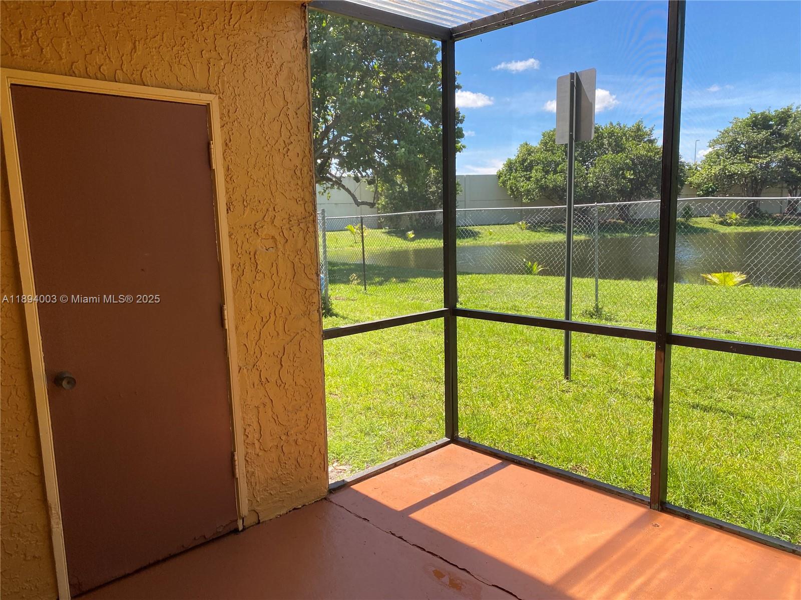 4453 Treehouse Lane, Unit C Tamarac, FL 33319 - Photo 17 of 21 a view of a porch