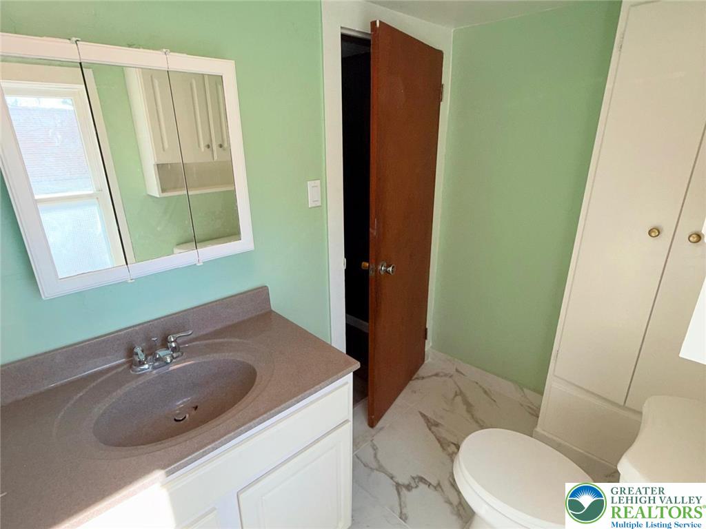 3420 Little Gap Road Palmerton, PA 18071 - Photo 14 of 26 a bathroom with a sink and a mirror