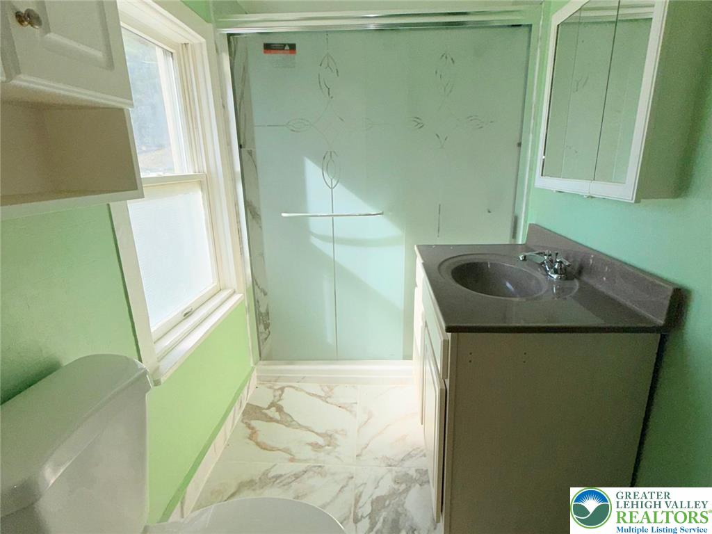 3420 Little Gap Road Palmerton, PA 18071 - Photo 17 of 26 a bathroom with a sink and a mirror