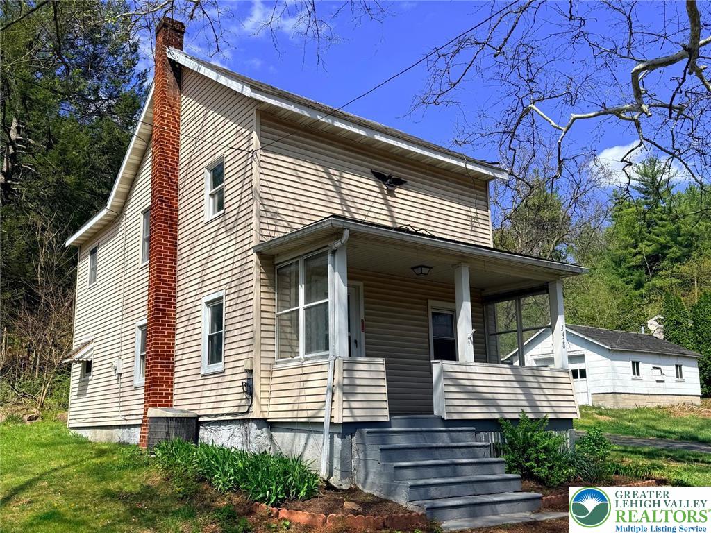 3420 Little Gap Road Palmerton, PA 18071 - Photo 2 of 26 a front view of a house with a yard