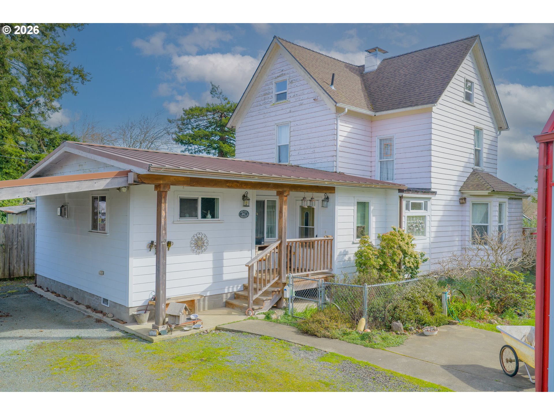 1150 West 8th Street Coquille, OR 97423 - Photo 1 of 42 a front view of a house with a yard