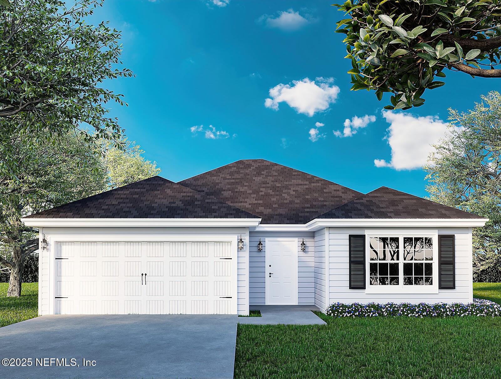 2019 Benedict Road Jacksonville, FL 32209 - Photo 1 of 1 a view of a house with a yard and garage