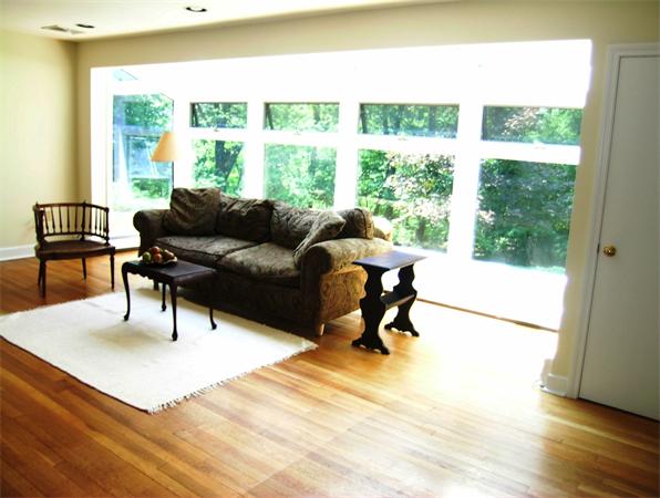 96 Conant Road Lincoln, MA 01773 - Photo 9 of 12 a living room with furniture and a large window