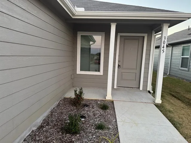 a view of house and front door
