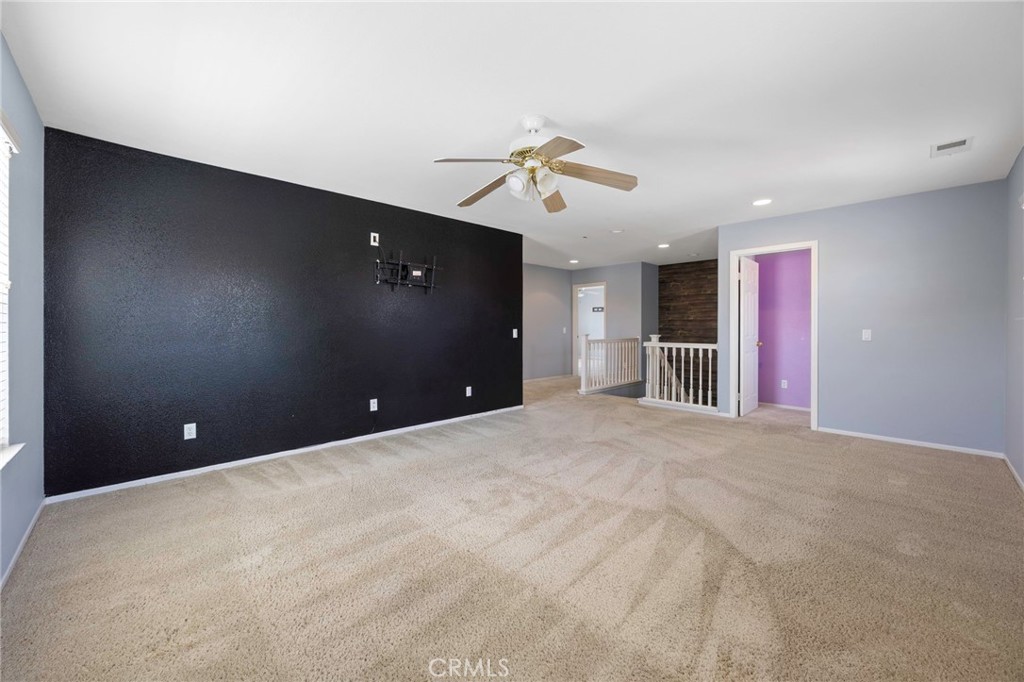 151 Ropango Way Hemet, CA 92545 - Photo 15 of 28 a view of a livingroom with a flat screen tv