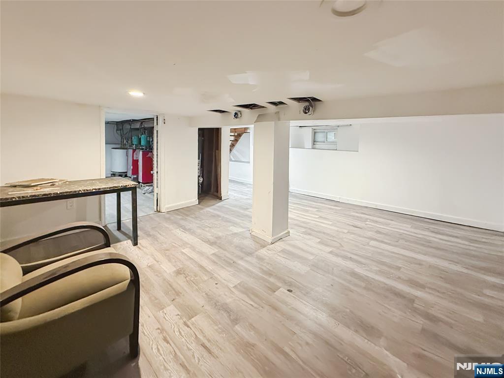 339 Howe Avenue, Unit 1 Passaic, NJ 07055 - Photo 16 of 23 a view of a hallway with seating space