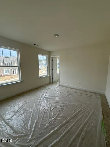 a view of a swimming pool with porch