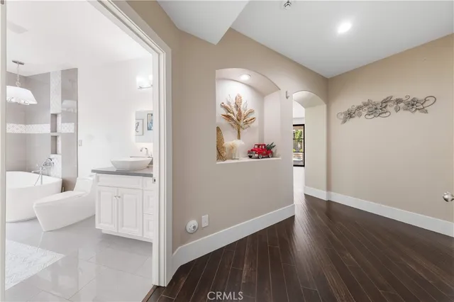 a bathroom with a shower and toilet