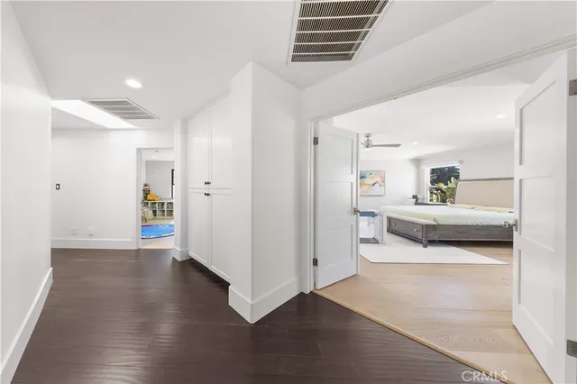 a room with furniture and wooden floor