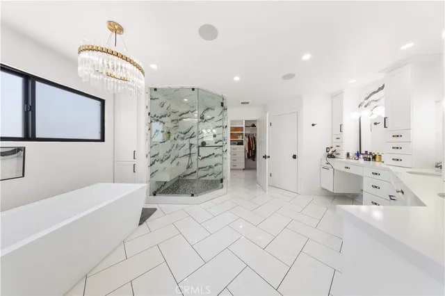 a bed room with a bed and a mirror