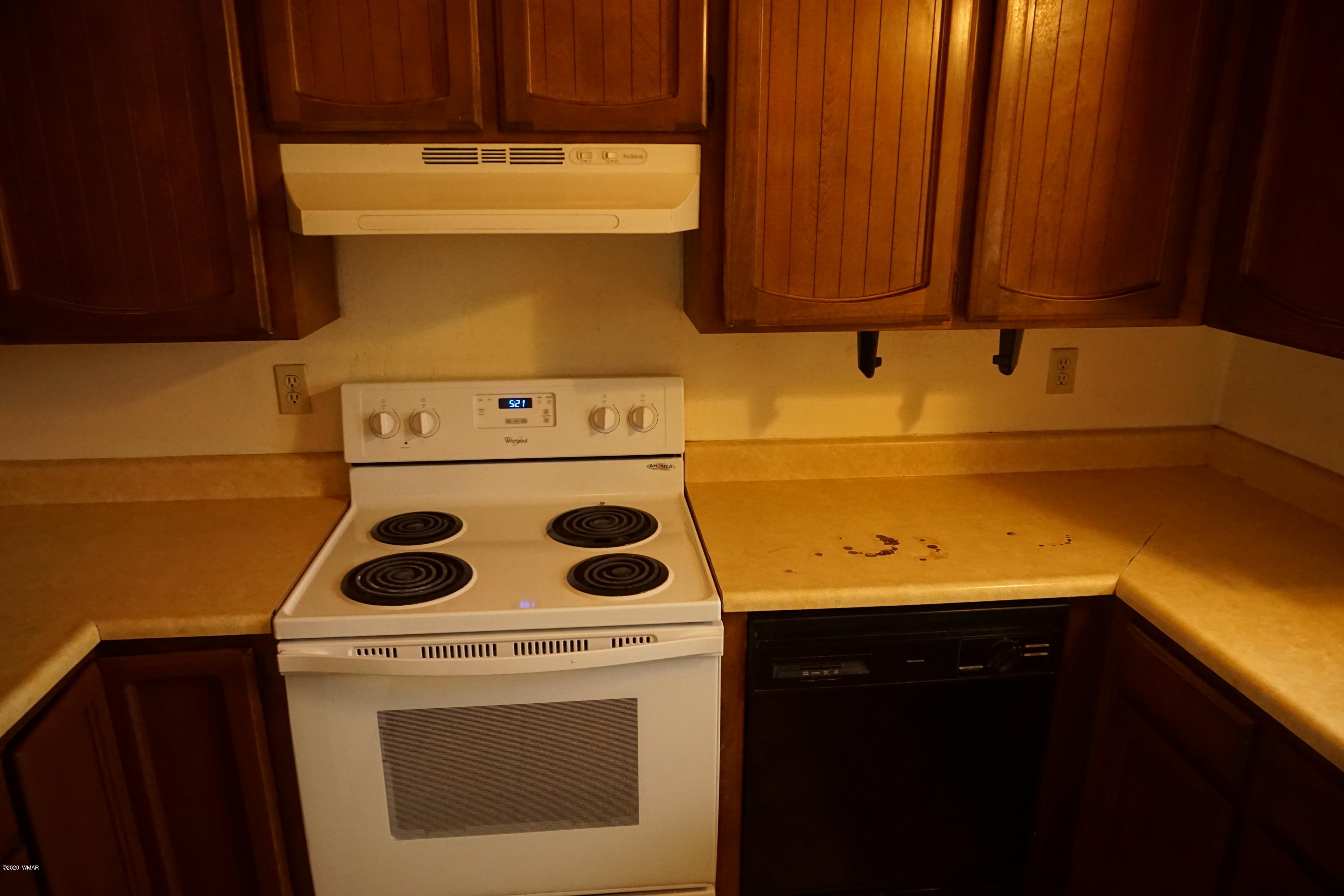 1110 7th West St. Johns, AZ 85936 - Photo 10 of 34 a view of a kitchen with a stove top oven